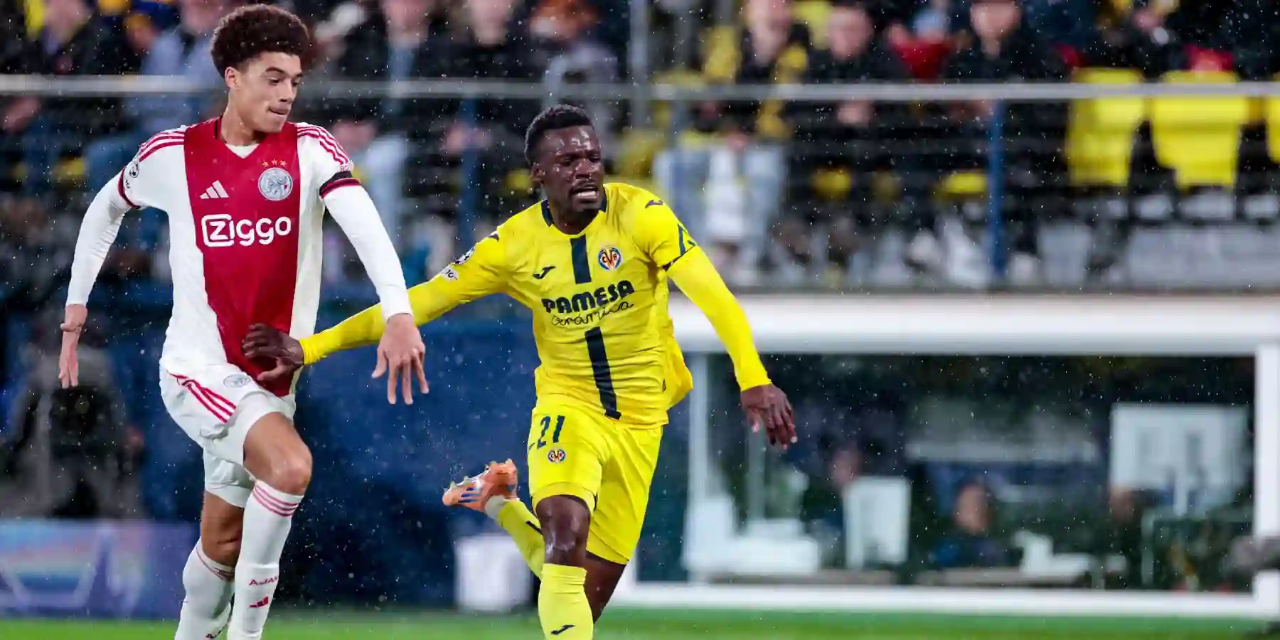 Villarreal and Ajax players running for the ball