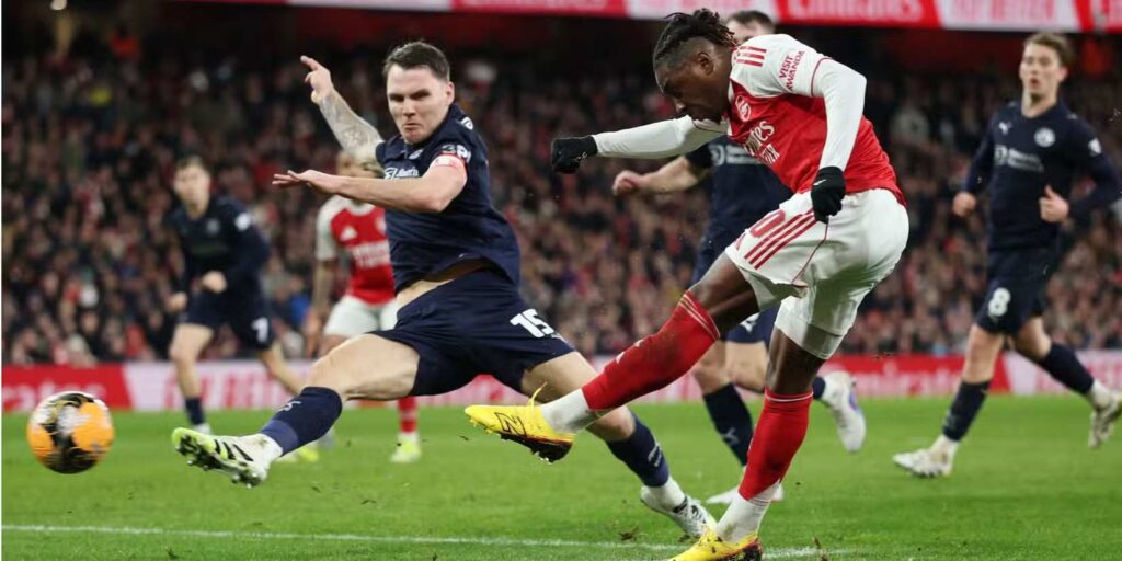 Eberechi Eze shoots at Wigan's goal