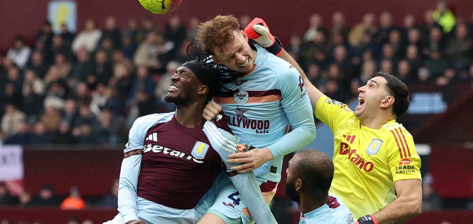 Aston Villa goalkeeper Emiliano Martinez punches a high ball