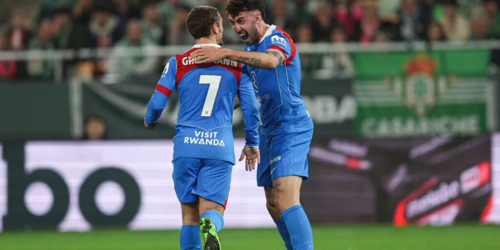 Atletico Madrid players celebrate after scoring against Betis
