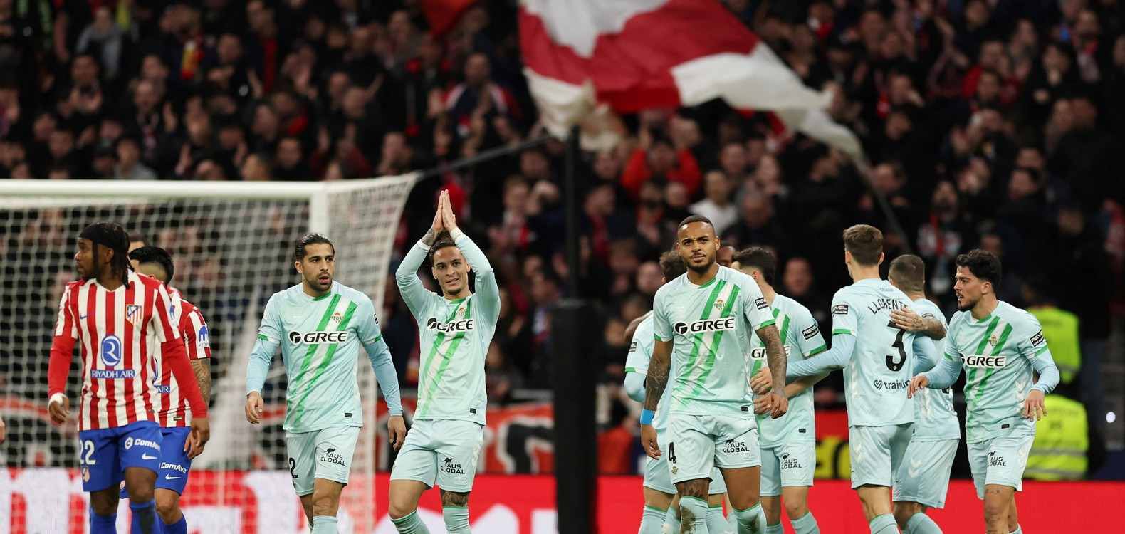 Beits players celebrate after scoring against Atletico Madrid