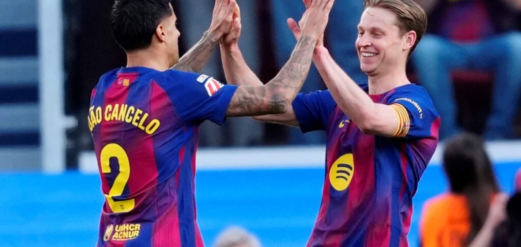 Barcelona players celebrate after scoring against Levante