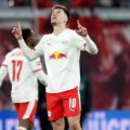 Brajan Gruda pointing to the sky after scoring late equaliser for RB Leipzig against Wolfsburg