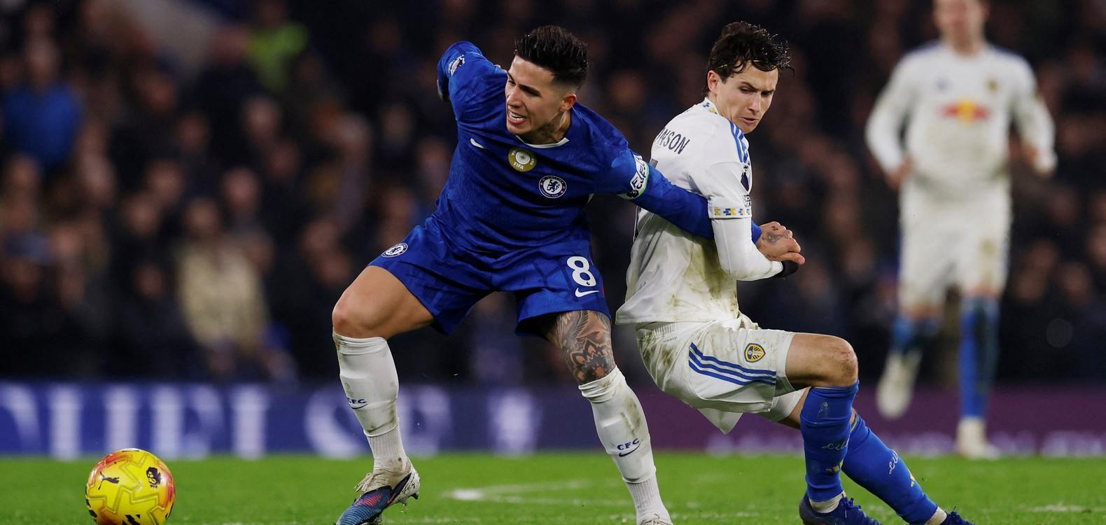 Enzo Fernandez and Brenden Aaronson in a battle for the ball