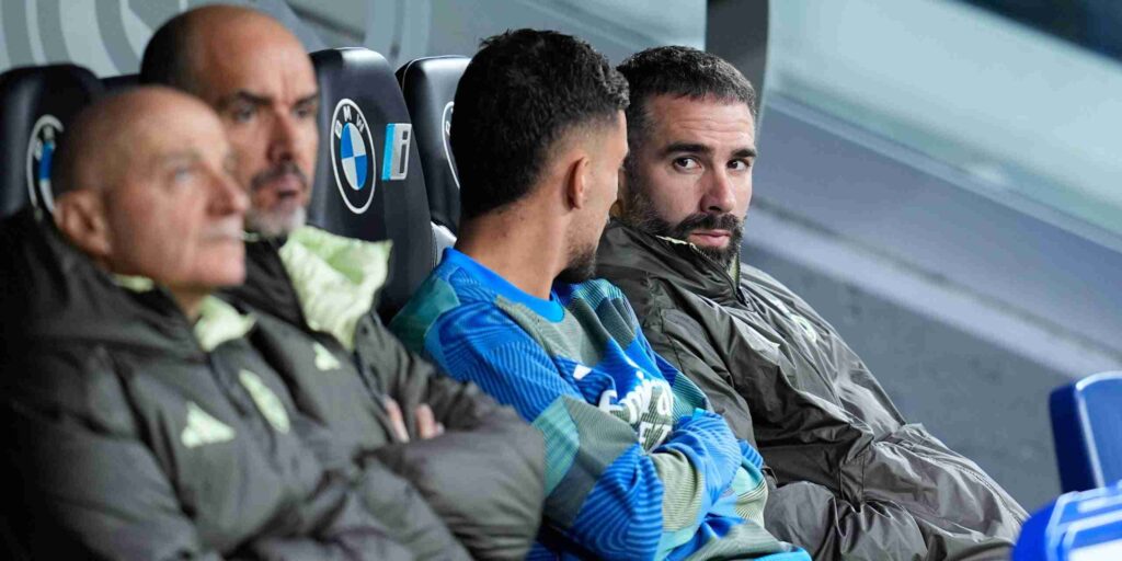 Daniel Carvajal sitting on Real Madrid bench