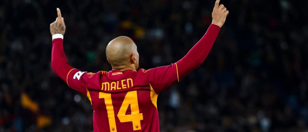 Donyell Malen celebrates after scoring for Roma