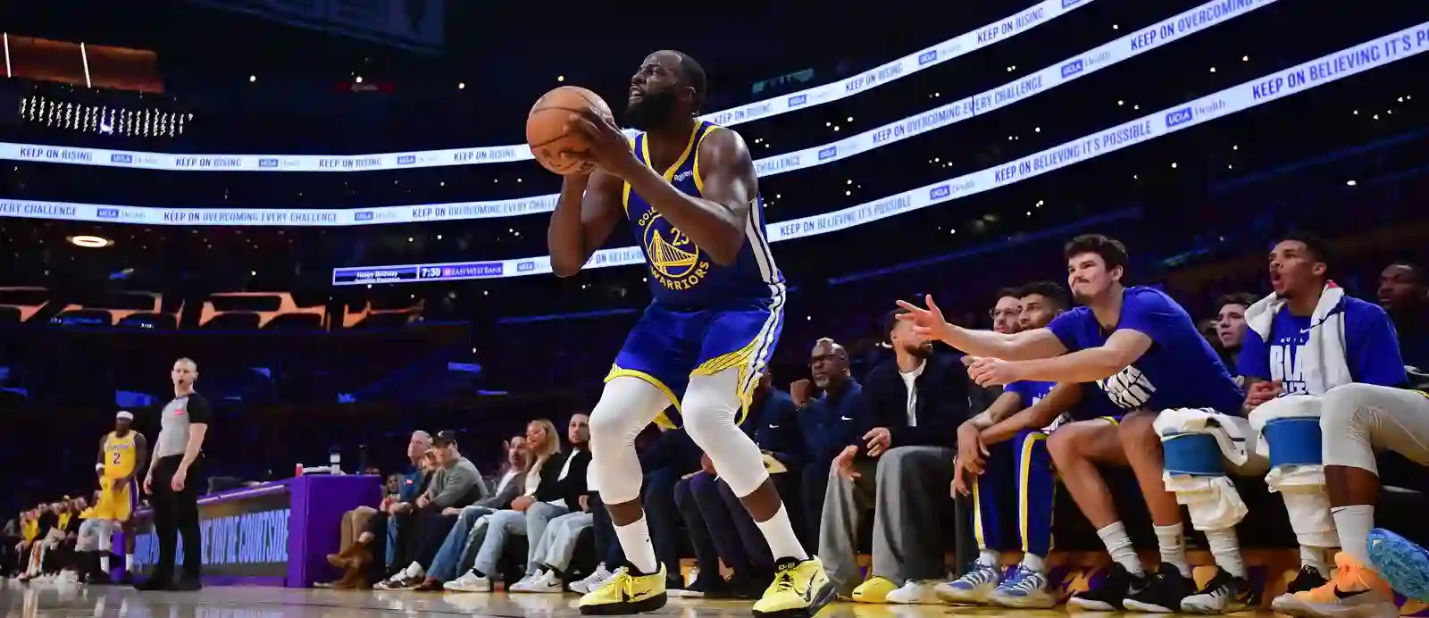 Draymond Green preparing to shoot a 3-pointer