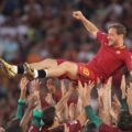 Francesco Totti lifted in the air by Roma teammates
