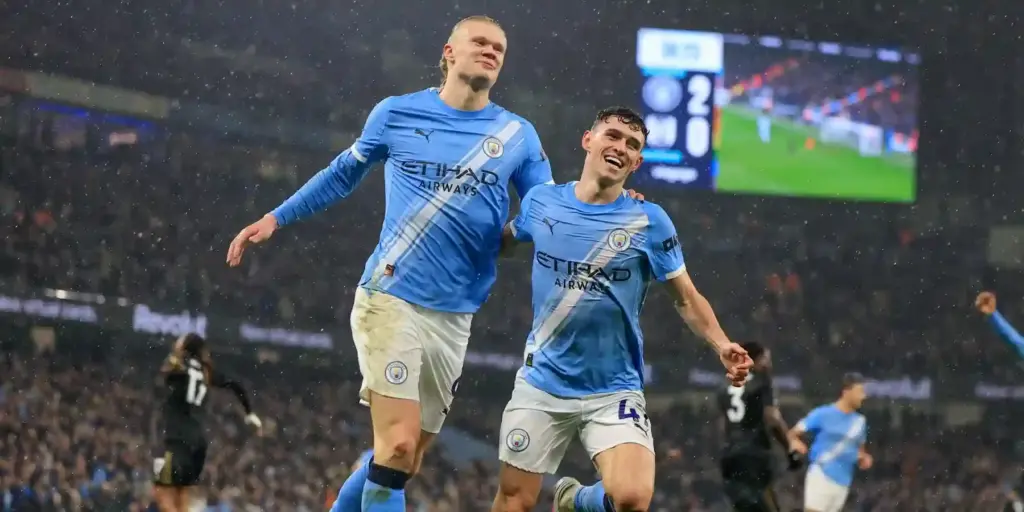 Erling Haaland and Phil Foden celebrate Manchester City goal against Fulham