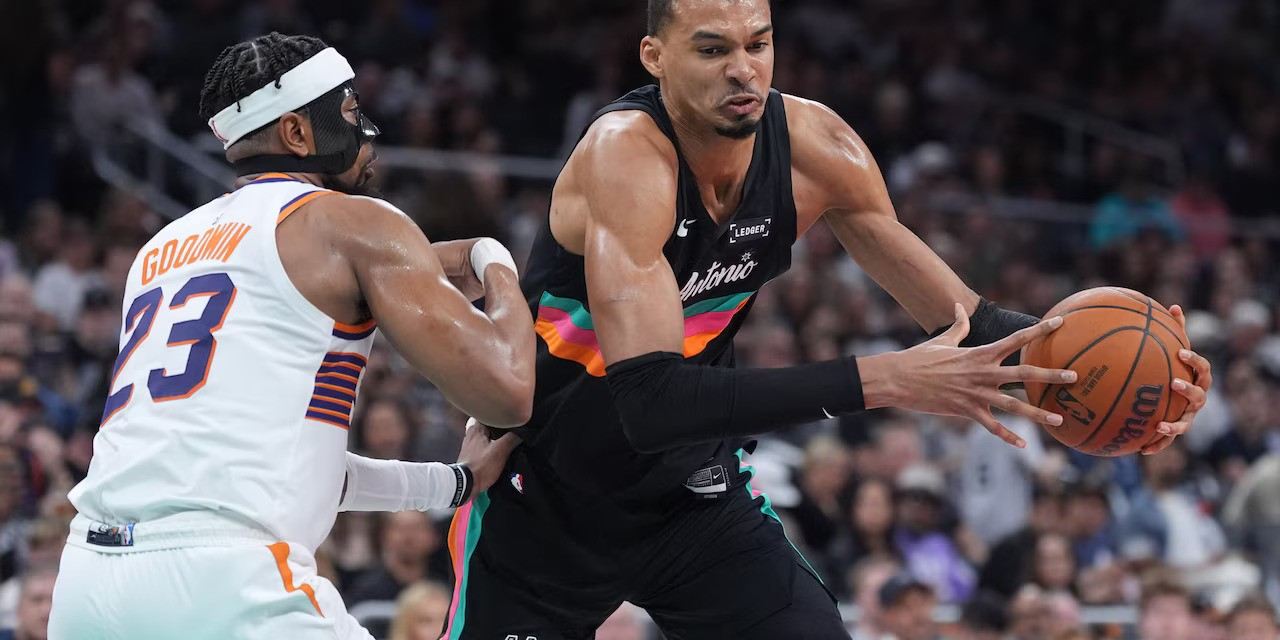 Jordan Goodwin guarding Victor Wembanyama