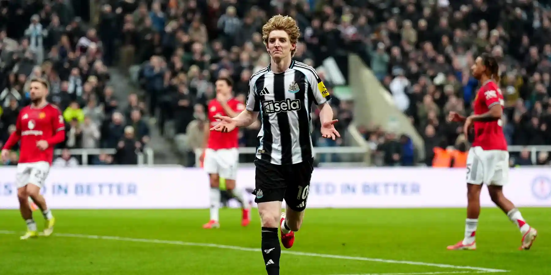 Anthony Gordon celebrates after scoring against Manchester United