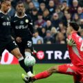 Joao Pedro chipping Emiliano Martinez