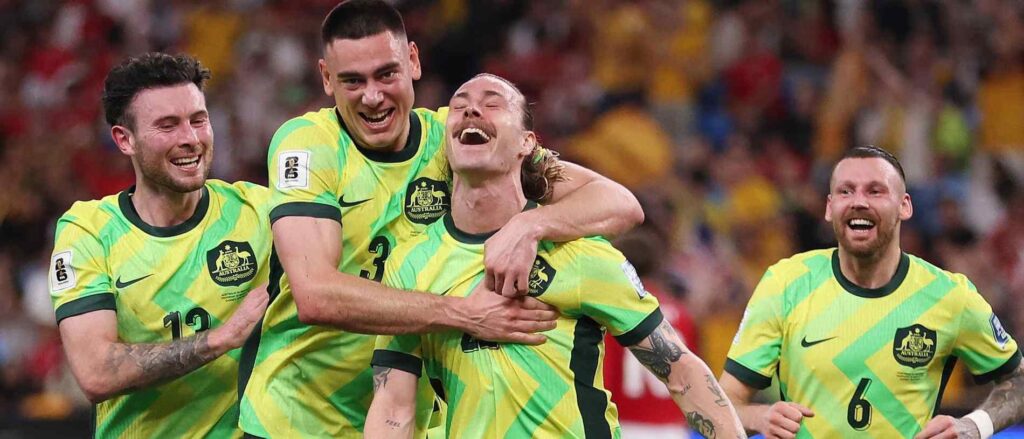 Australia National Team players celebrate after scoring a goal