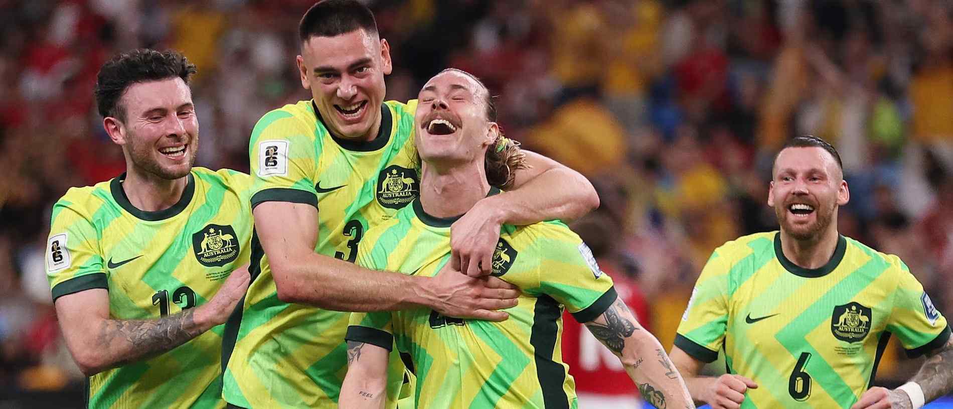 Australia National Team players celebrate after scoring a goal