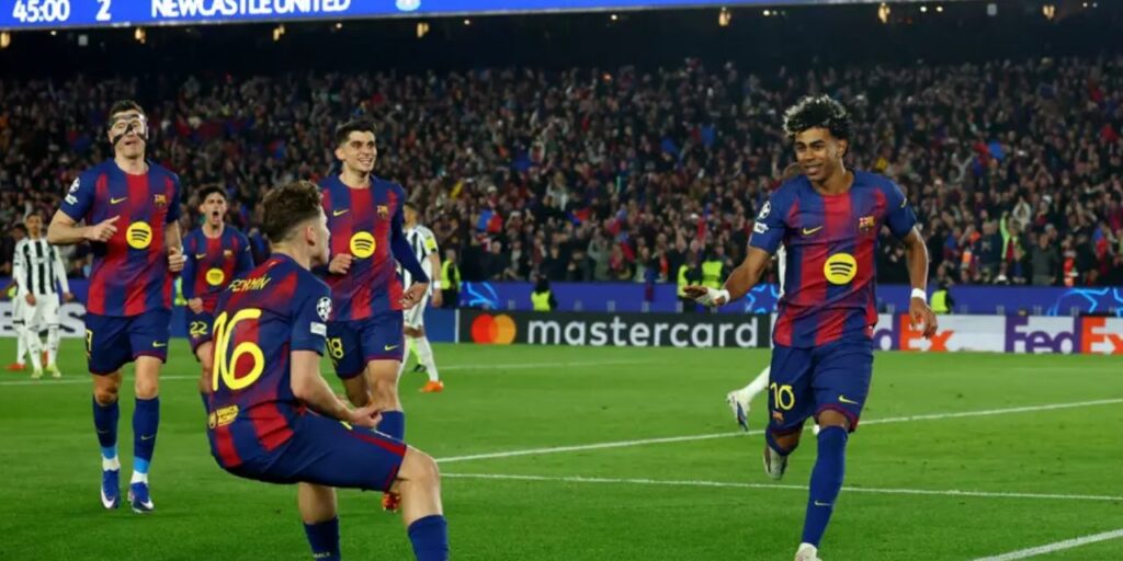 Barcelona players celebrate after scoring against Newcastle
