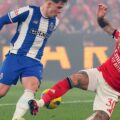 Porto player dribbles past Benfica opponent