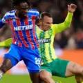 Crystal Palace and AEK players in a battle for the ball