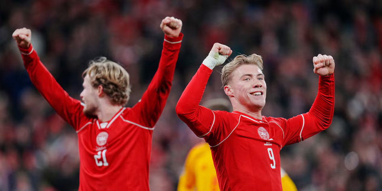 Denmark players celebrate after eliminating North Macedonia