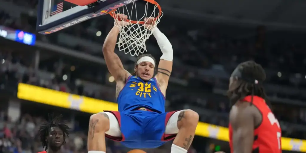 Aaron Gordon dunking the ball in Portland's basket