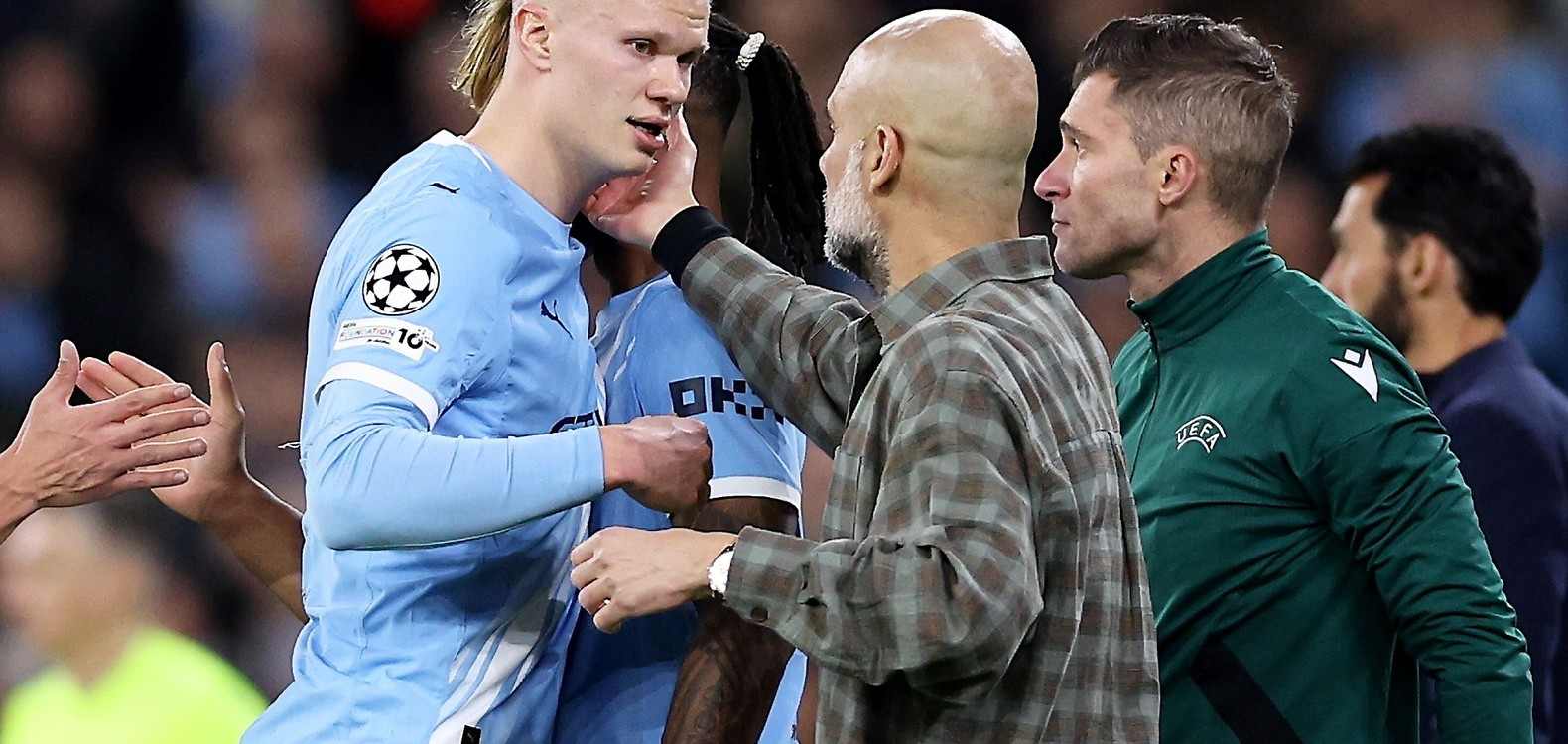 Pep Guardiola and Erling Haaland