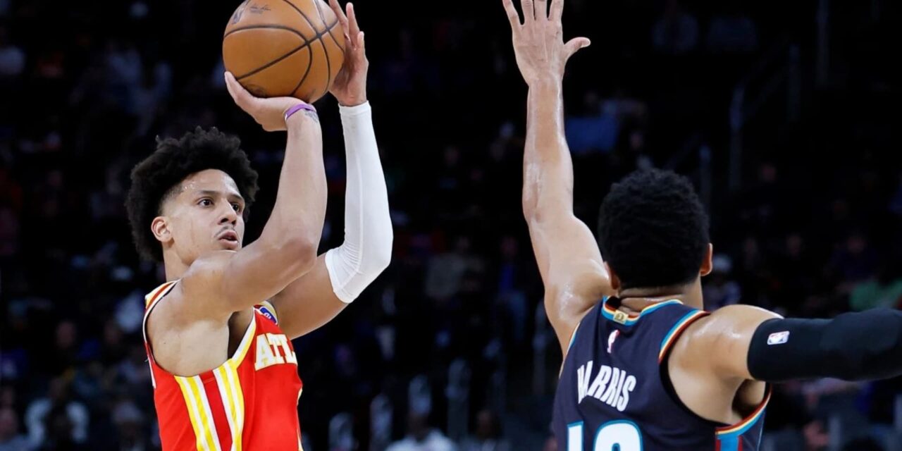Jalen Johnson shooting over Tobias Harris