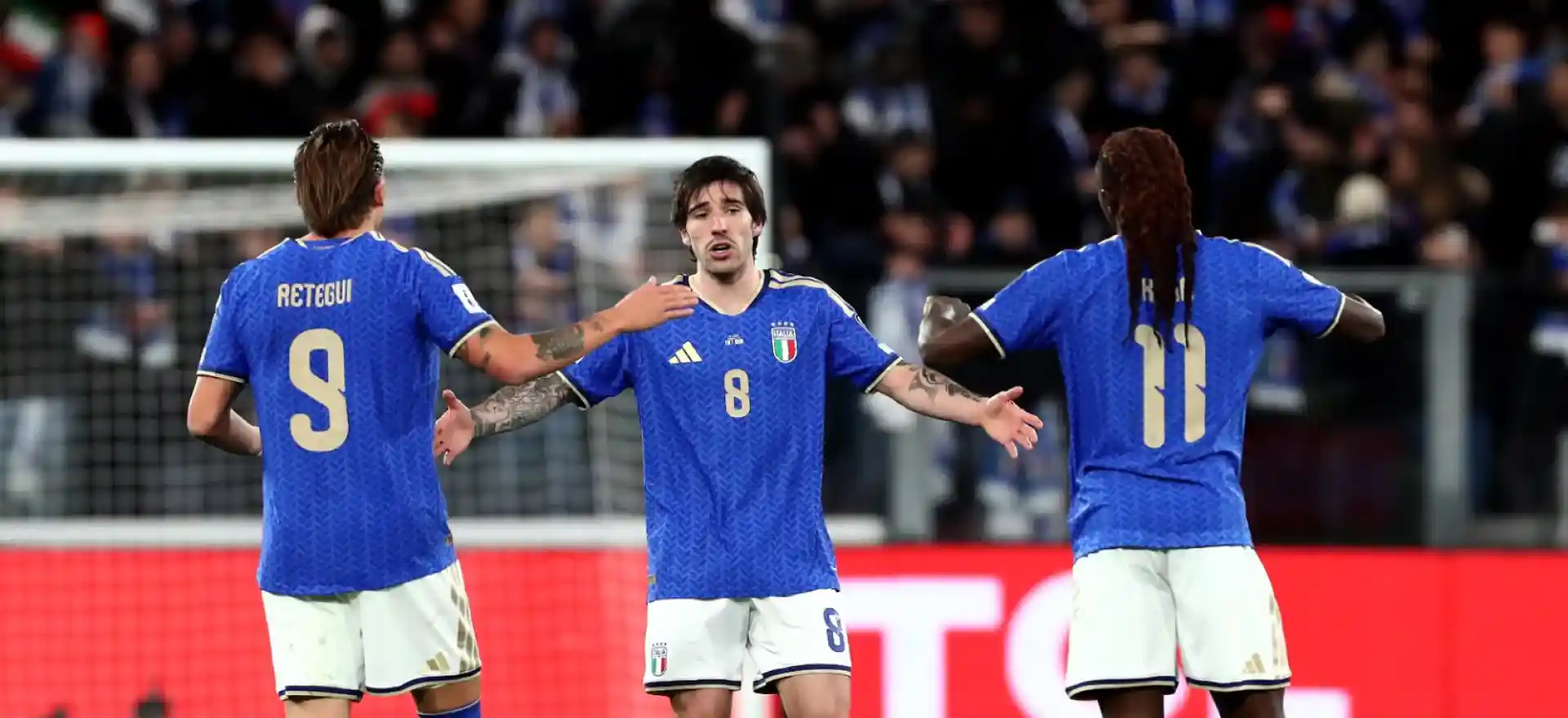 Italy players celebrate after scoring against Northern Ireland