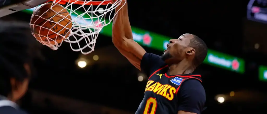 Jonathan Kuminga dunking the ball