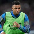 Kylian Mbappe warming up