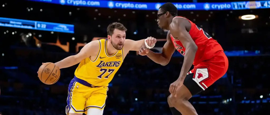 Luka Doncic guarded by Jalen Smith