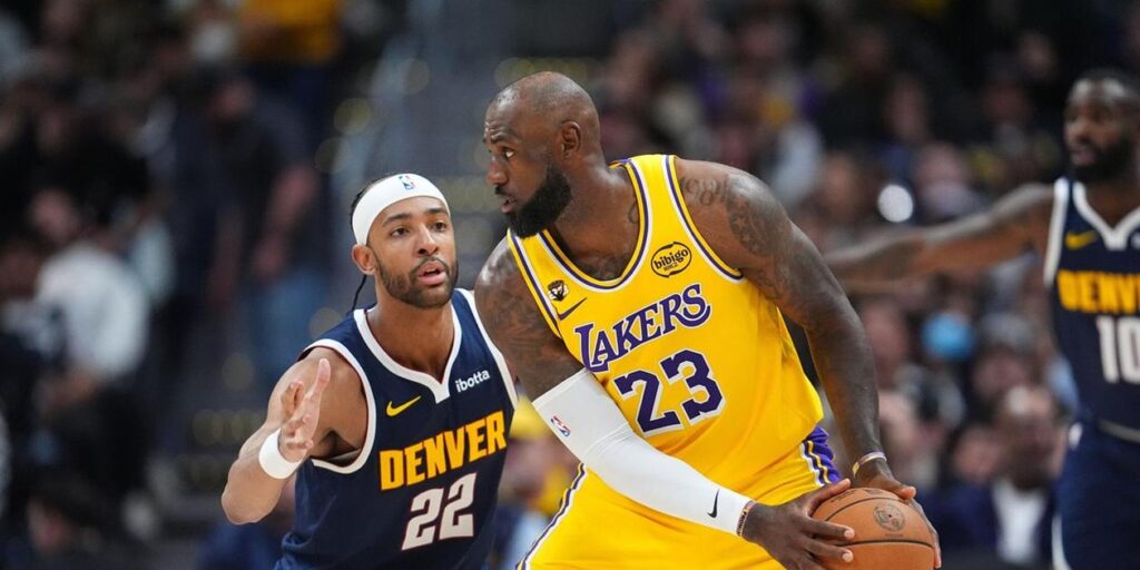 LeBron James guarded by Zeke Nnaji