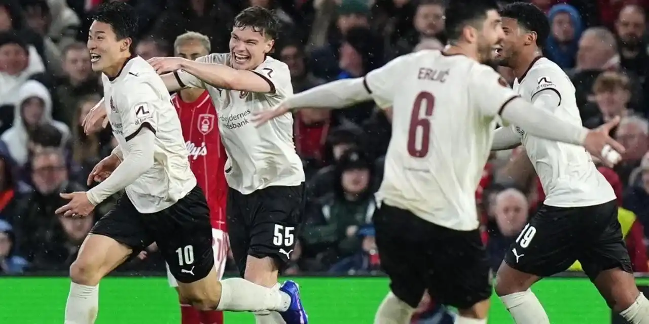 Midtjylland players celebrate after taking the lead against Nottingham