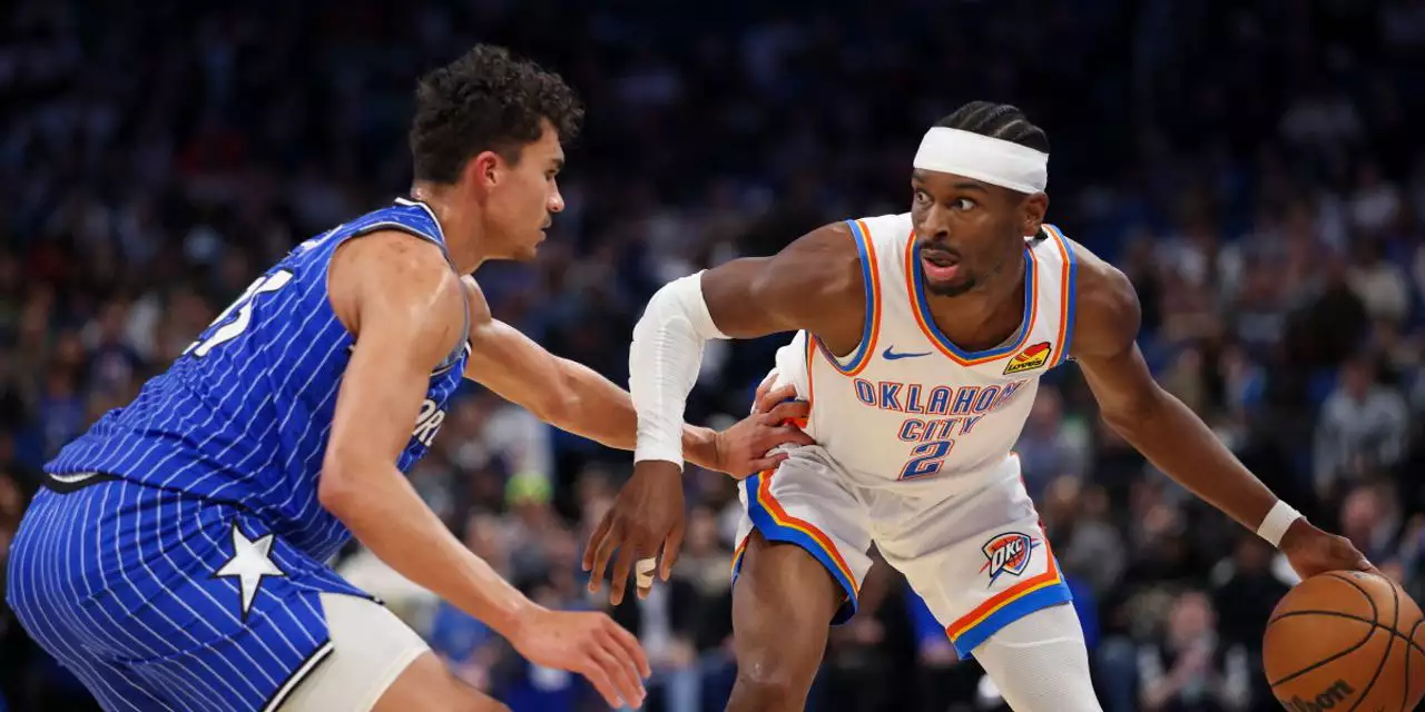 Shai Gilgeous-Alexander guarded by Tristan da Silva