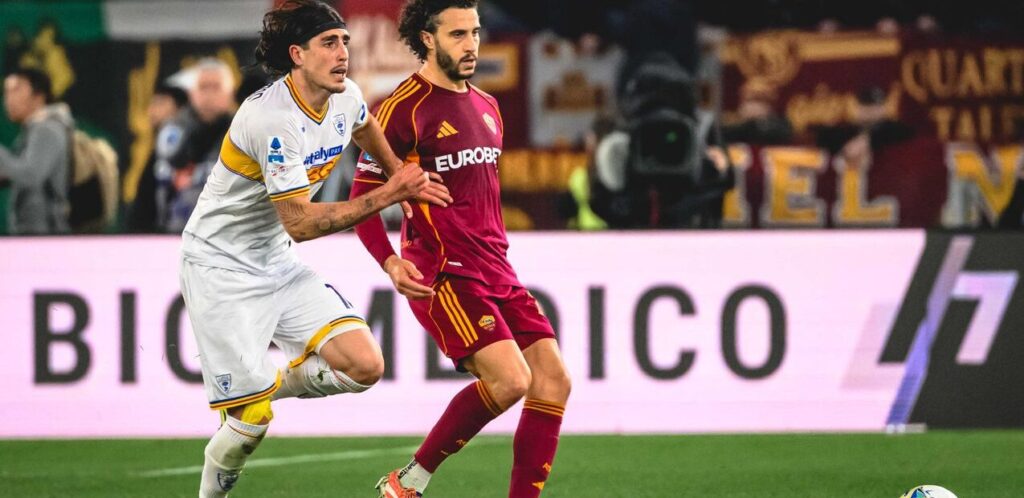 Roma and Lecce players during their Serie A clash