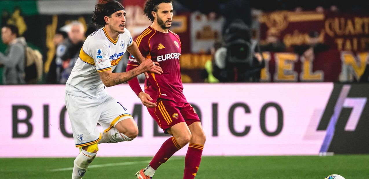 Roma and Lecce players during their Serie A clash