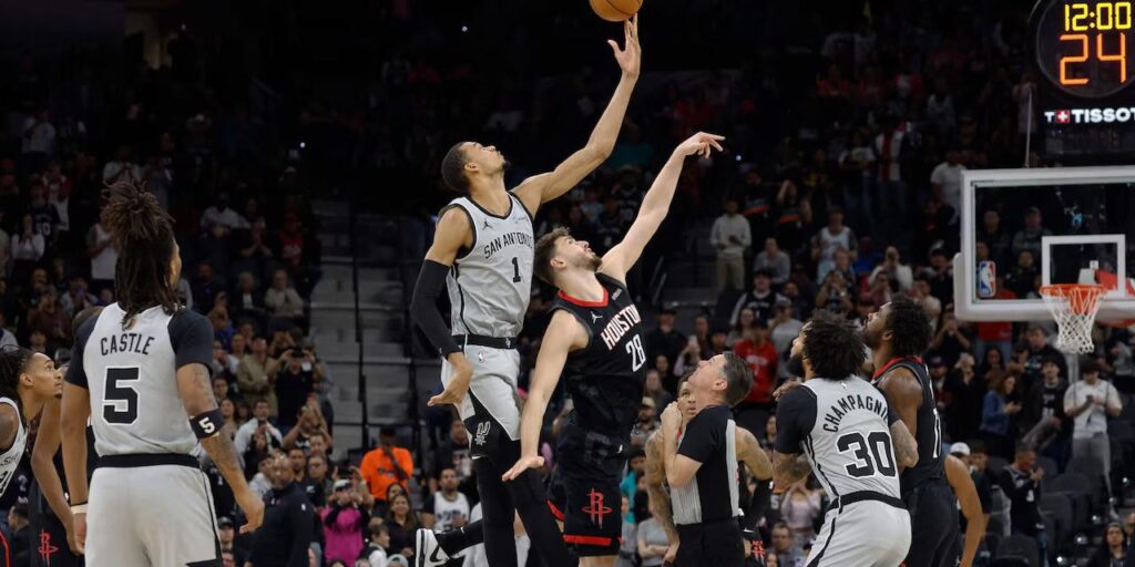 Victor Wembanyama blocking Alperen Sengun's shot