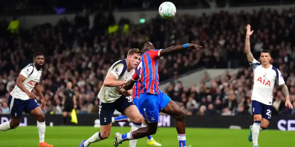 Micky van de Ven bringing down Ismaila Sarr in Tottenham's penalty box