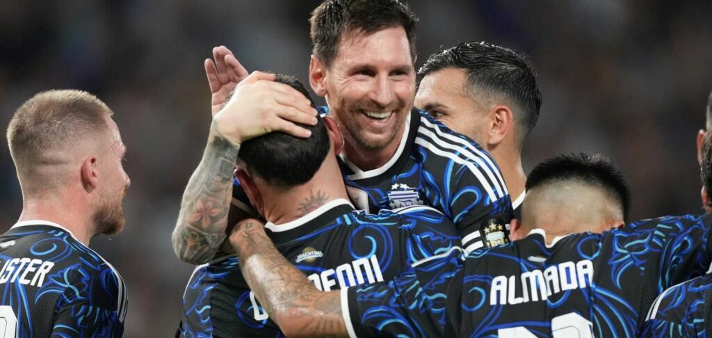 Argentina players celebrate after scoring against Zambia in a friendly match