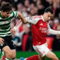 Arsenal and Sporting players in a battle for the ball
