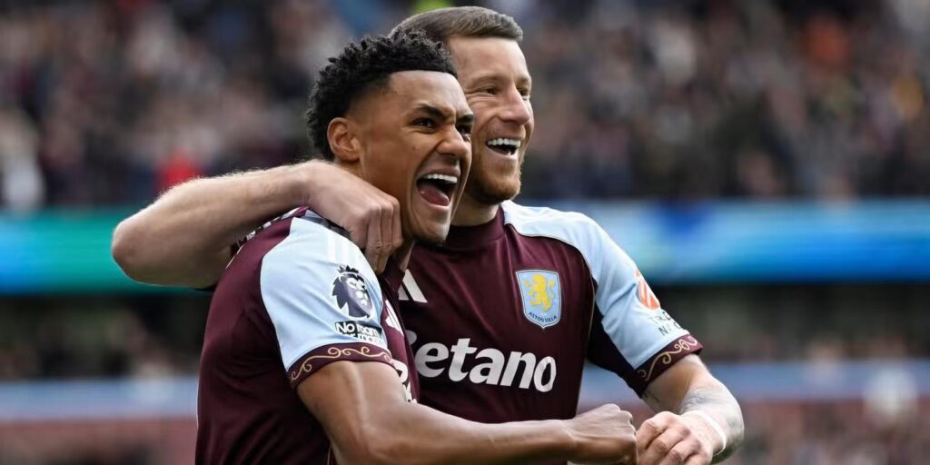Aston Villa players celebrate after scoring against Sunderland