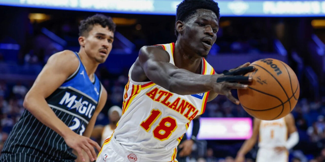 Mouhamed Gueye dribbles the ball