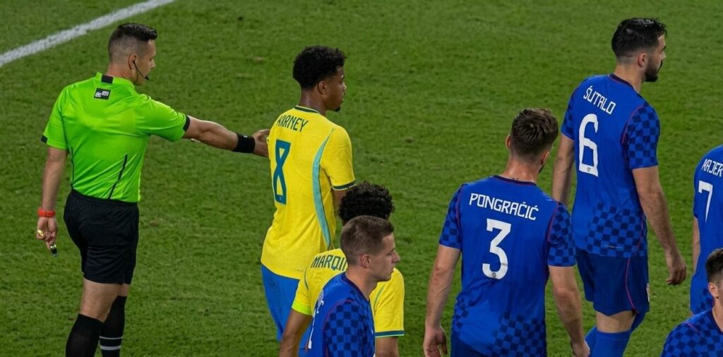 Referee awarding Brazil a penalty in the friendly match against Croatia