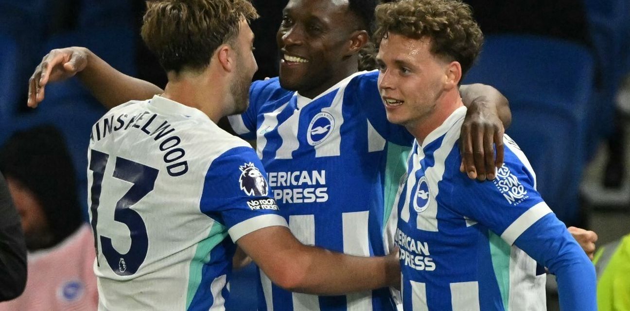 Brighton players celebrate after scoring against Chelsea