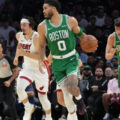 Jayson Tatum dribbling the ball