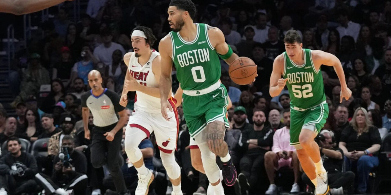 Jayson Tatum dribbling the ball