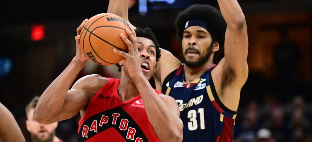 Scottie Barnes guarded by Jarrett Allen