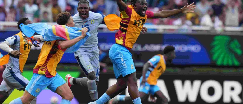 DR Congo players rush to celebrate after defeating Jamaica