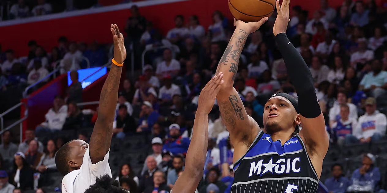 Paolo Banchero shoots at Detroit Pistons' basket