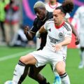 Koln and Eintracht players in a battle for the ball