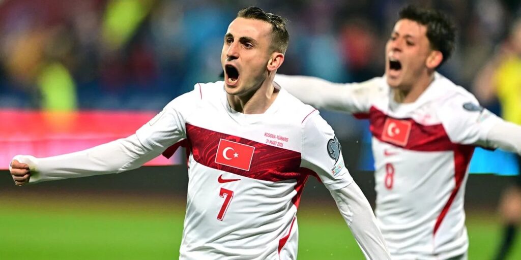 Kerem Aktürkoğlu and Arda Guler celebrate after Turkiye has scored against Kosovo