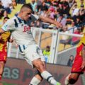Atalanta player shooting towards Lecce's goal